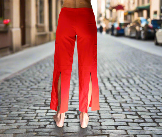 Women's eco-friendly Bright Red Freedom Pant in sustainable Tencel fabric — wide-leg yoga pants with drawstring waist and cargo pockets showing the back view, cute butt and slits down back of pants